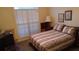 Comfortable bedroom with natural light, a window with blinds, and a serene atmosphere for relaxation at 2562 Pendergrass Ct, Ellenwood, GA 30294