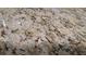 Close-up of the speckled granite countertops, highlighting the stone's natural beauty and texture at 2562 Pendergrass Ct, Ellenwood, GA 30294