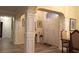 Entryway showcasing decorative columns, wood-look flooring, and natural lighting at 2562 Pendergrass Ct, Ellenwood, GA 30294