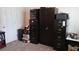 Bright room featuring metal file cabinets and a tall cupboard, with boxes stacked near a doorway at 2562 Pendergrass Ct, Ellenwood, GA 30294