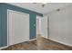 Bedroom featuring a closet, ample floor space, and a door to the hall at 6940 Roswell Rd # E12, Atlanta, GA 30328