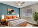 Bedroom with colorful decor, a ceiling fan, and a window at 6940 Roswell Rd # E12, Atlanta, GA 30328