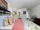 Spacious bedroom featuring natural light, and stylish furniture at 75 Fair Haven Se Way, Smyrna, GA 30080