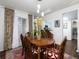 Bright dining room with hardwood floors and access to patio at 75 Fair Haven Se Way, Smyrna, GA 30080