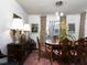 Elegant dining room with hardwood floors and a large table at 75 Fair Haven Se Way, Smyrna, GA 30080