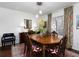 Elegant dining room with hardwood floors and a large table at 75 Fair Haven Se Way, Smyrna, GA 30080