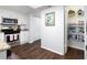 White kitchen with stainless steel appliances and large pantry at 75 Fair Haven Se Way, Smyrna, GA 30080