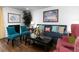 Cozy living room features a fireplace, hardwood floors, and comfortable seating at 75 Fair Haven Se Way, Smyrna, GA 30080