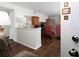 Open living room with hardwood floors and built-in shelving at 75 Fair Haven Se Way, Smyrna, GA 30080