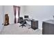 Home office setup with large desk and a display shelf at 679 Stickley Oak Way, Woodstock, GA 30189