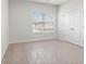 Well-lit bedroom with large window and double doors at 625 Skytop Dr, Cumming, GA 30040