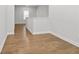 Bright hallway with hardwood floors and neutral walls at 625 Skytop Dr, Cumming, GA 30040