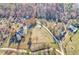 Aerial view of the home and property with mature landscaping and trees in a serene, wooded setting at 3975 Mcconnell Rd, Cumming, GA 30028