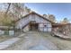 Rustic barn with ample space for storage or livestock, featuring a unique staircase and wooded surroundings at 3975 Mcconnell Rd, Cumming, GA 30028