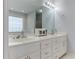 Elegant bathroom with double vanity, ample counter space, and updated fixtures at 3975 Mcconnell Rd, Cumming, GA 30028