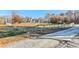 Beautiful property with partial driveway view and a sturdy fence surrounding the yard at 3975 Mcconnell Rd, Cumming, GA 30028