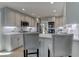 Stylish kitchen with light gray cabinets, quartz countertops, and stainless steel appliances at 3975 Mcconnell Rd, Cumming, GA 30028