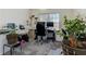 Bright office space with neutral carpet, windows, multiple desks, and natural lighting at 3975 Mcconnell Rd, Cumming, GA 30028