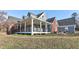 Spacious covered porch featuring metal railings, offering a great outdoor living space and curb appeal at 3975 Mcconnell Rd, Cumming, GA 30028