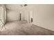 Large carpeted bedroom with multiple closets and doorways, offering flexibility and convenience at 678 Emeril Dr, Avondale Estates, GA 30002