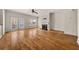 Bright living room featuring hardwood floors, a fireplace, and access to a private balcony at 678 Emeril Dr, Avondale Estates, GA 30002