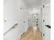 Hallway features hardwood floors, white doors, and black hardware at 2860 3Rd Sw Ave, Atlanta, GA 30315