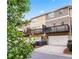 Exterior view of townhomes, each with garage, deck, and neutral color palettes at 4192 Integrity Way, Powder Springs, GA 30127
