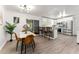 Bright kitchen boasts modern stainless steel appliances and a stylish breakfast bar with seating at 2793 Heritage Ln, Morrow, GA 30260