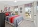 Charming bedroom with large windows and contemporary furnishings, providing a relaxing atmosphere at 1416 Lucan Ln # Wc220, Lawrenceville, GA 30043