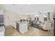 Open-concept kitchen with stainless appliances flows into the living area, perfect for entertaining at 1416 Lucan Ln # Wc220, Lawrenceville, GA 30043