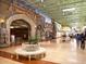 Indoor mall entrance features a grand Medieval Times themed entry with stone arches and flags at 1416 Lucan Ln # Wc220, Lawrenceville, GA 30043
