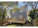 Expansive backyard view featuring a deck, and newly installed gray siding at 60 Newcastle Sw St, Atlanta, GA 30314