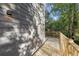 Outdoor deck with wood railings off new construction home at 60 Newcastle Sw St, Atlanta, GA 30314