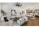 Cozy living room with hardwood floors, modern decor, and an open view into the dining area and kitchen at 60 Newcastle Sw St, Atlanta, GA 30314
