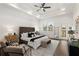This modern main bedroom offers a sitting area, backyard views, and access to the backyard at 60 Newcastle Sw St, Atlanta, GA 30314