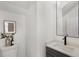 Stylish powder room featuring a modern vanity and quartz counters at 60 Newcastle Sw St, Atlanta, GA 30314