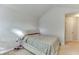 Cozy bedroom featuring plush carpeting, a queen bed, and a bright window at 510 Jefferson Chase St, Atlanta, GA 30354