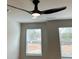 Bedroom with a ceiling fan and two windows that provide ample lighting at 109 Meadowview Dr # 22, Temple, GA 30179