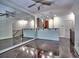 Open-concept space with hardwood floors that connects the living area and kitchen at 221 Semel Nw Cir # 273, Atlanta, GA 30309
