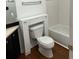 Bathroom with toilet featuring custom cabinet at 333 Pickfair Sw Way, Atlanta, GA 30315