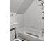 Full bathroom featuring white tile and a tub and shower combination at 333 Pickfair Sw Way, Atlanta, GA 30315