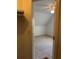 View of a cozy, carpeted room with a sloped ceiling and a ceiling fan at 333 Pickfair Sw Way, Atlanta, GA 30315