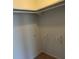 Walk-in closet with built-in shelving at 333 Pickfair Sw Way, Atlanta, GA 30315