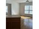 A dining area and kitchen with natural light creating a welcoming space for cooking and dining at 333 Pickfair Sw Way, Atlanta, GA 30315
