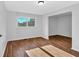 Bright bedroom with wood flooring and access to an additional room at 2142 Cloverdale Se Dr, Atlanta, GA 30316