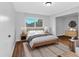 Spacious bedroom with wood flooring, large windows, and room for a sitting area at 2142 Cloverdale Se Dr, Atlanta, GA 30316
