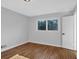 Bright bedroom with wood-look floors and a large window at 2142 Cloverdale Se Dr, Atlanta, GA 30316