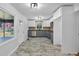 Modern kitchen, featuring gray cabinets and marble floors at 2142 Cloverdale Se Dr, Atlanta, GA 30316