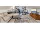 Finished attic living area with comfortable seating, a television, and ample storage space at 1770 South Olympian Sw Way, Atlanta, GA 30310