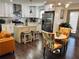 Bright eat-in kitchen with stainless steel appliances, white cabinets, and a herringbone backsplash at 1770 South Olympian Sw Way, Atlanta, GA 30310